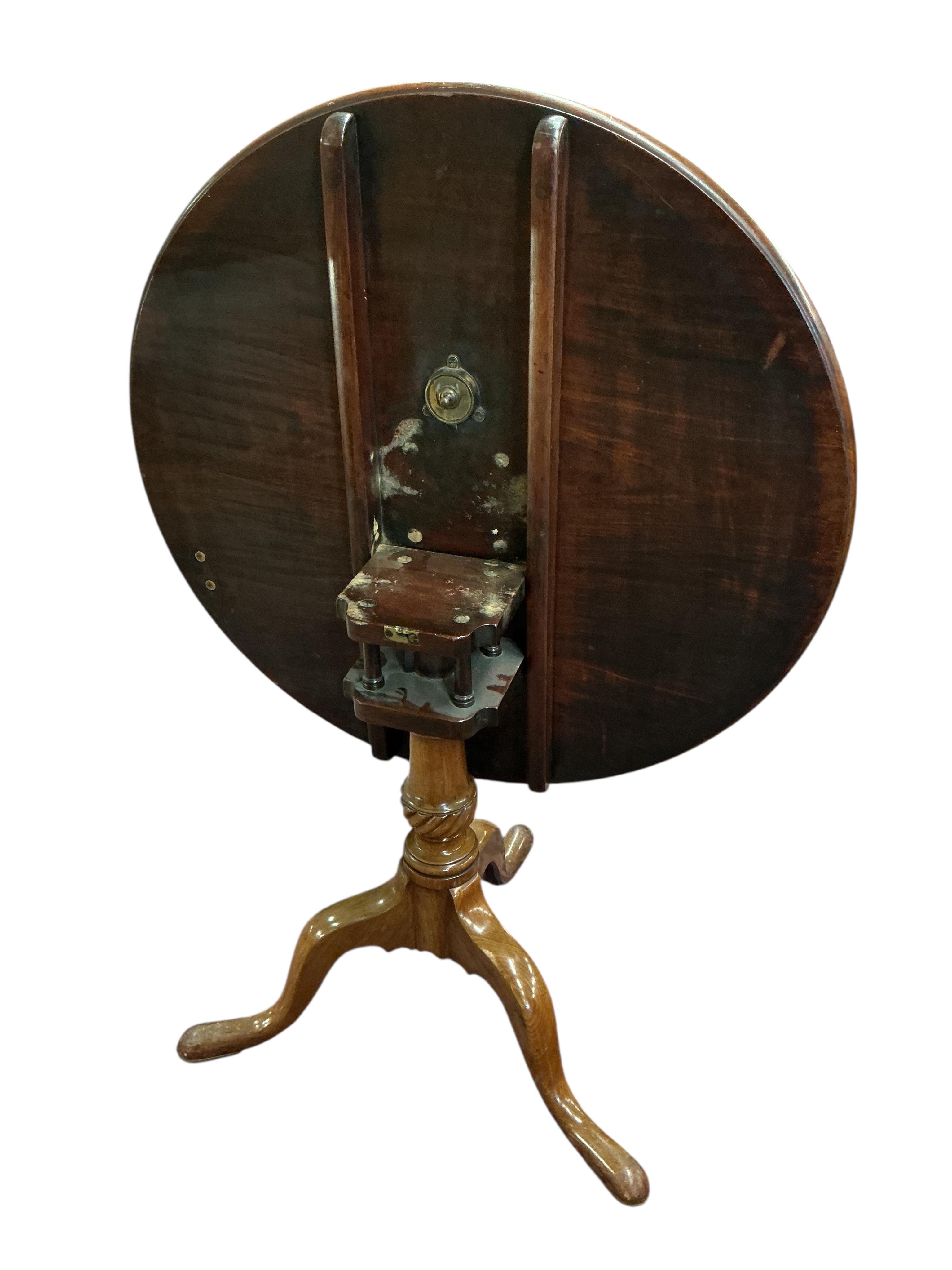 A George III circular mahogany tilt top tripod birdcage tea table, diameter 79cm, height 69cm